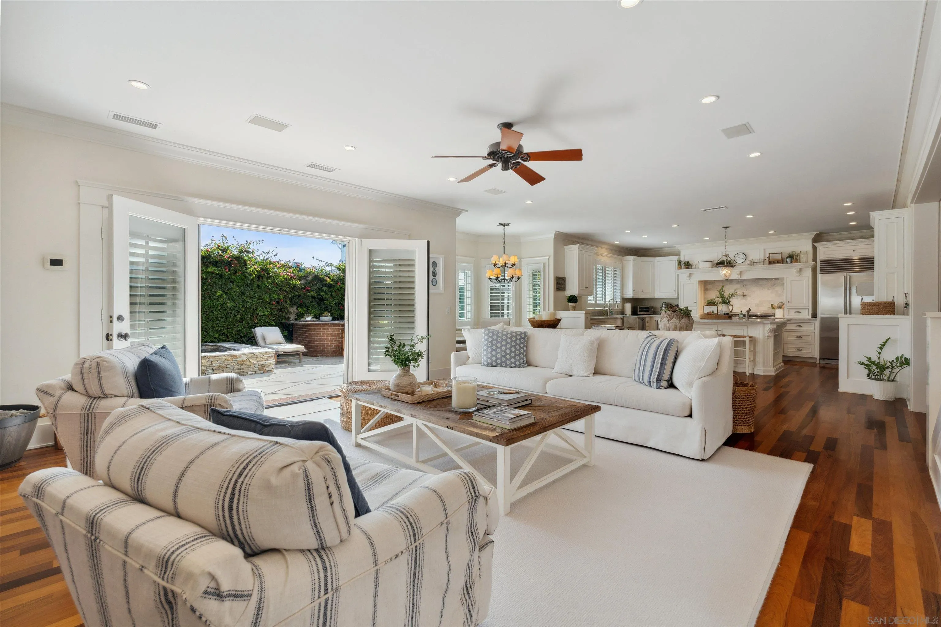 731 Balboa Avenue Coronado, CA 92118 - Photo 9 of 18 a living room with furniture kitchen view and a large window