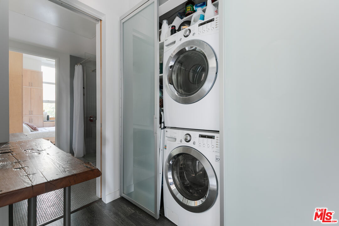 4080 Glencoe Avenue, Unit 219 Marina del Rey, CA 90292 - Photo 12 of 31 a view of a hallway with washer and dryer