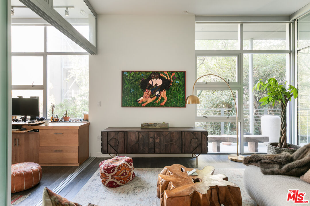 4080 Glencoe Avenue, Unit 219 Marina del Rey, CA 90292 - Photo 14 of 31 a bedroom with furniture and a large window