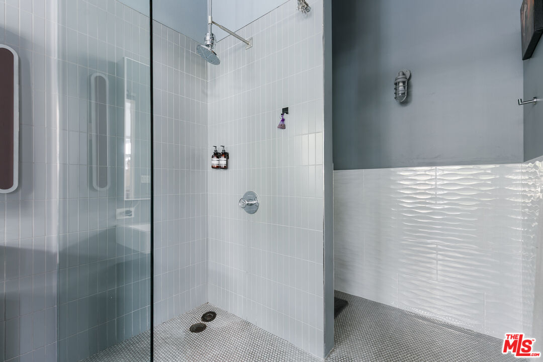 4080 Glencoe Avenue, Unit 219 Marina del Rey, CA 90292 - Photo 20 of 31 a bathroom with a shower