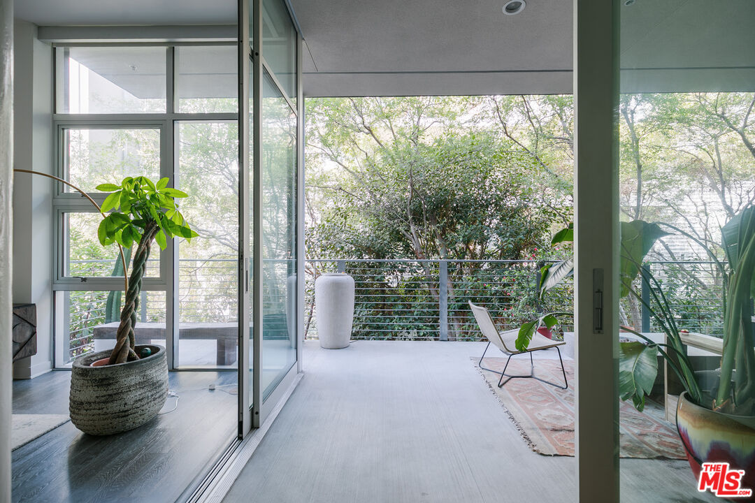 4080 Glencoe Avenue, Unit 219 Marina del Rey, CA 90292 - Photo 22 of 31 a view of a porch and garden