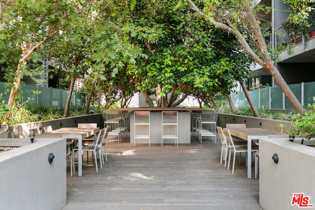 4080 Glencoe Avenue, Unit 219 Marina del Rey, CA 90292 - Photo 26 of 31 an outdoor space with furniture and potted plants