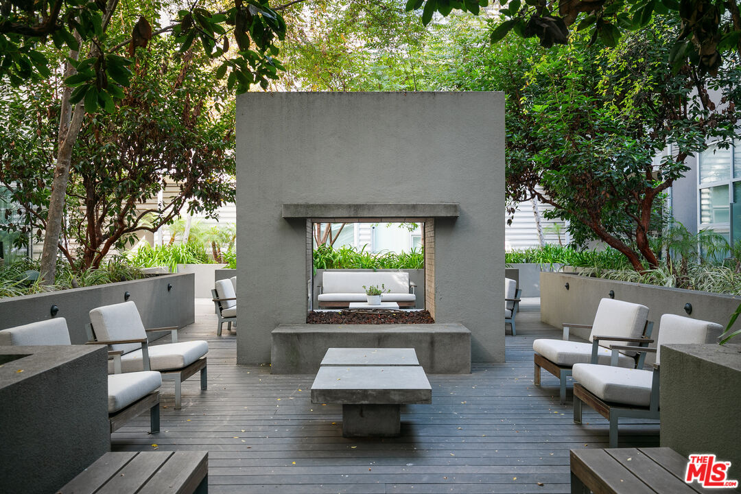 4080 Glencoe Avenue, Unit 219 Marina del Rey, CA 90292 - Photo 27 of 31 swimming pool view with couches and potted plants