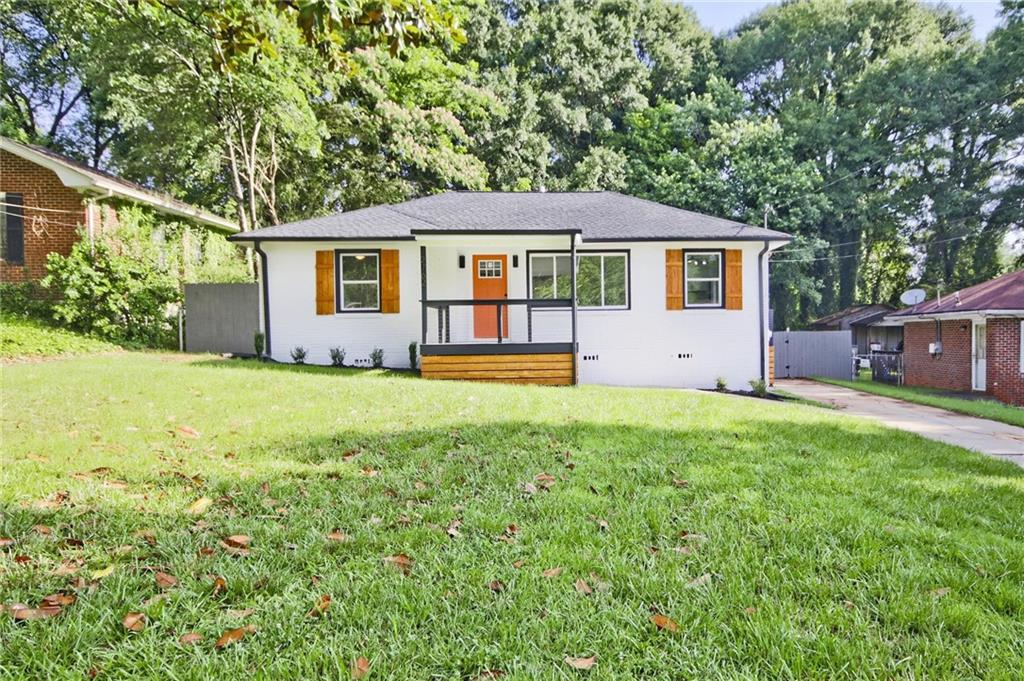 2762 Wedgewood Terrace Decatur, GA 30032 - Photo 1 of 1 a front view of a house with a yard