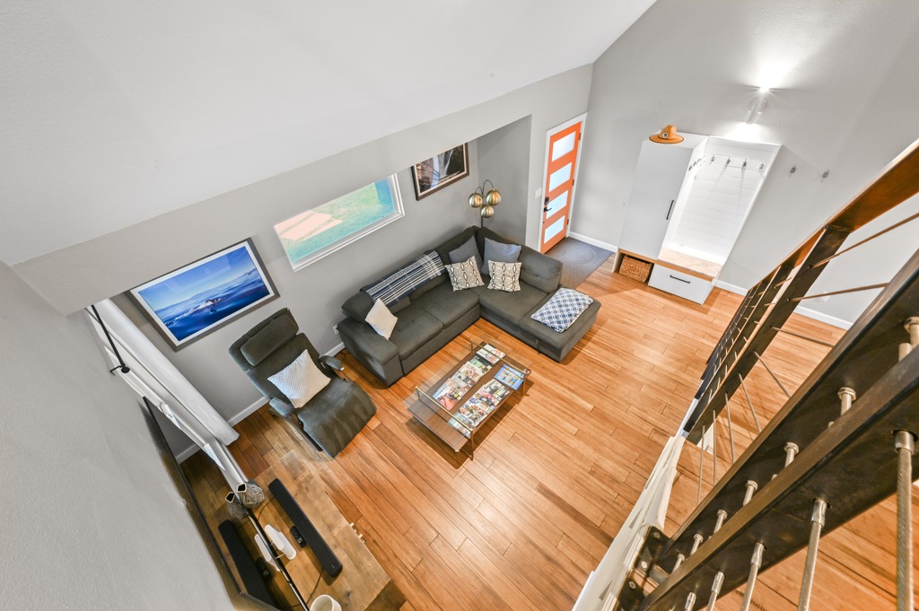 2101 Airole Way, Unit B Austin, TX 78704 - Photo 17 of 28 a living room with furniture and floor to ceiling windows