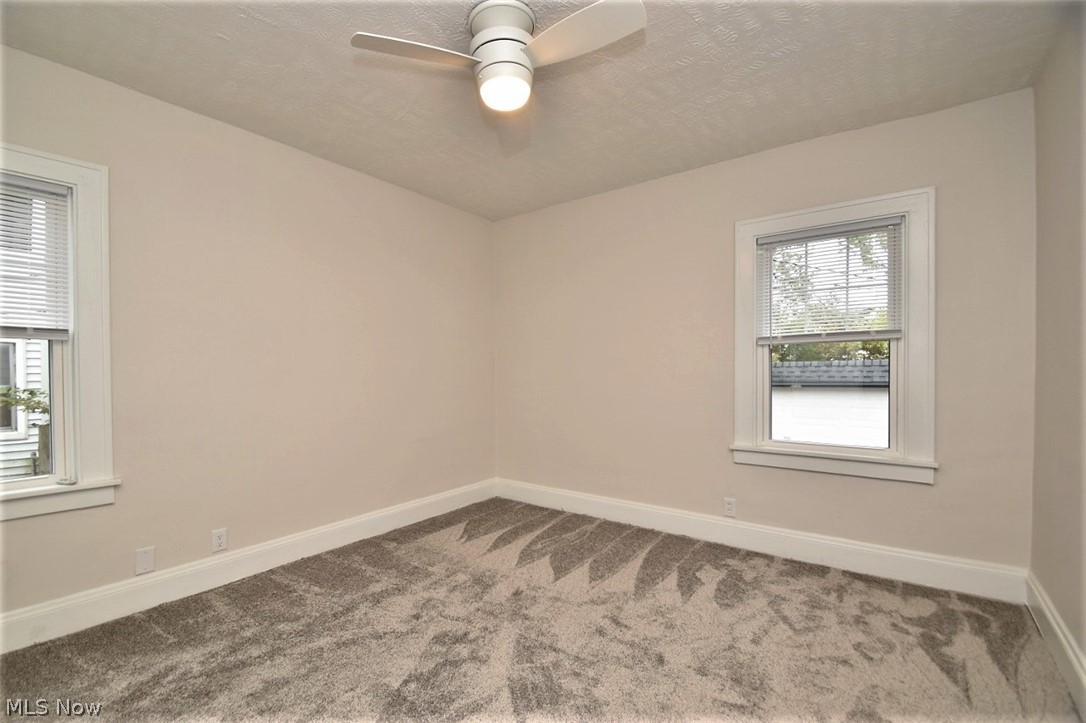 3964 Ardmore Road Cleveland Heights, OH 44121 - Photo 14 of 33 First floor bedroom has new carpet, fresh paint, and a ceiling fan/light.