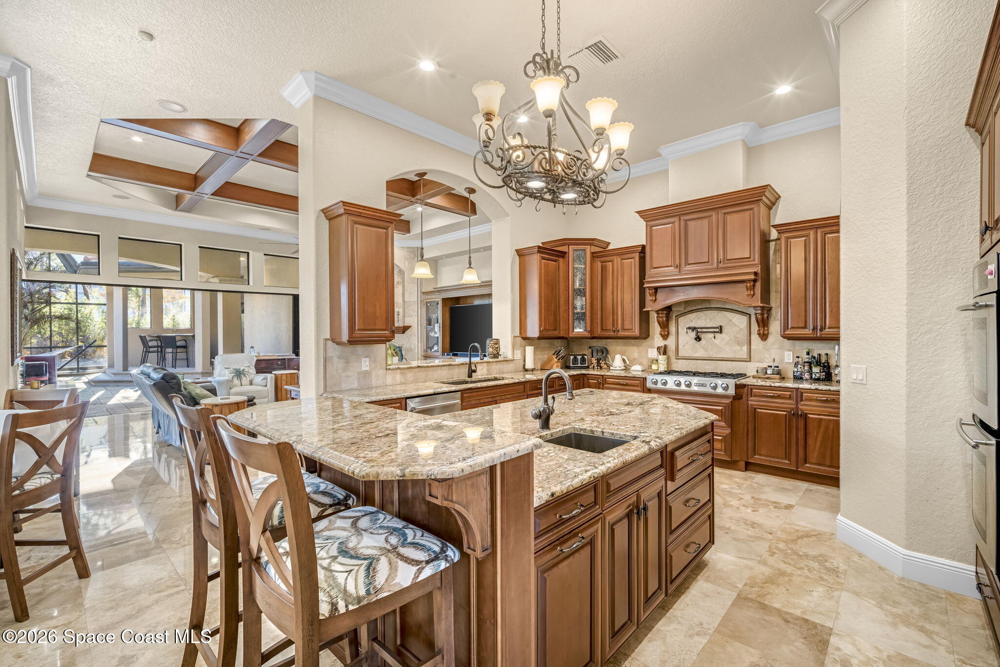 5454 Riveredge Drive Titusville, FL 32780 - Photo 16 of 70 a large kitchen with a table and chairs