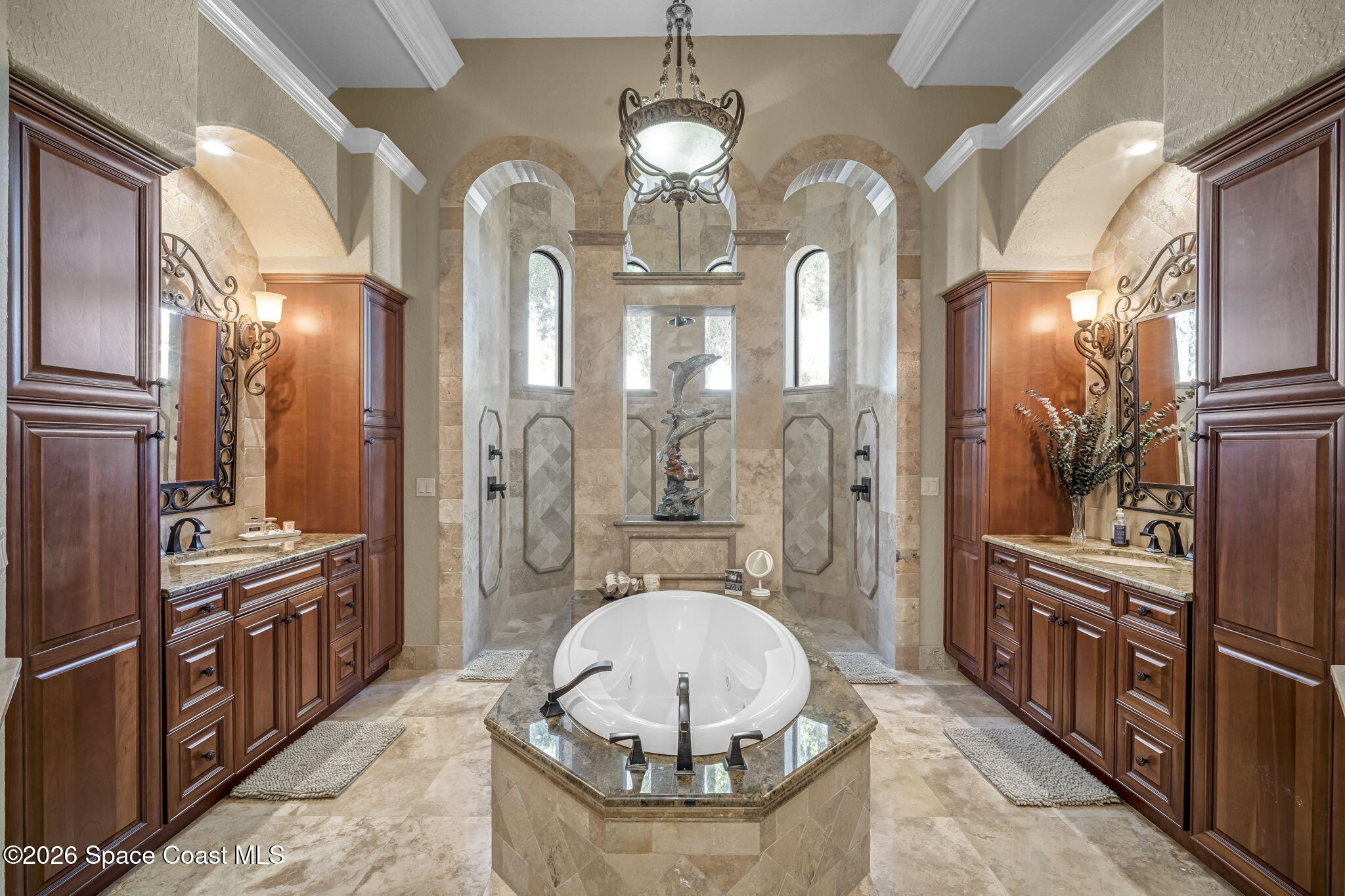 5454 Riveredge Drive Titusville, FL 32780 - Photo 29 of 70 a view of a kitchen with stainless steel appliances granite countertop a stove a refrigerator and a chandelier