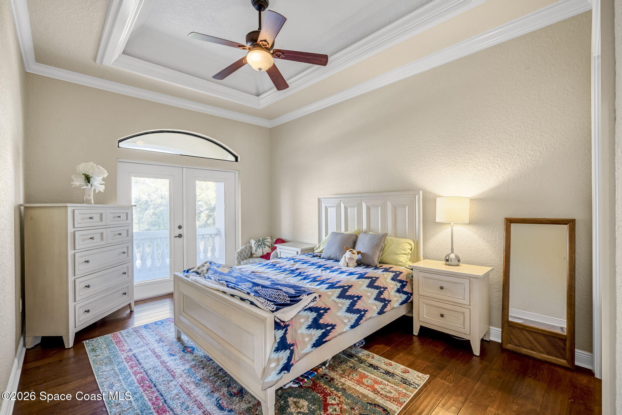 5454 Riveredge Drive Titusville, FL 32780 - Photo 34 of 70 a bedroom with a bed and a dresser