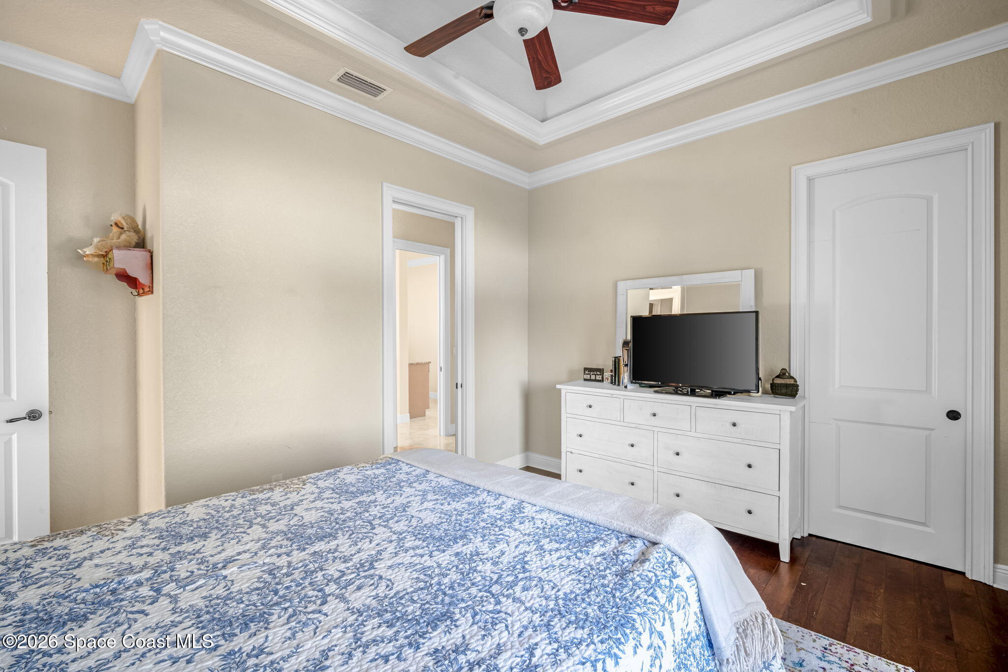 5454 Riveredge Drive Titusville, FL 32780 - Photo 37 of 70 a bedroom with a bed and a flat screen tv