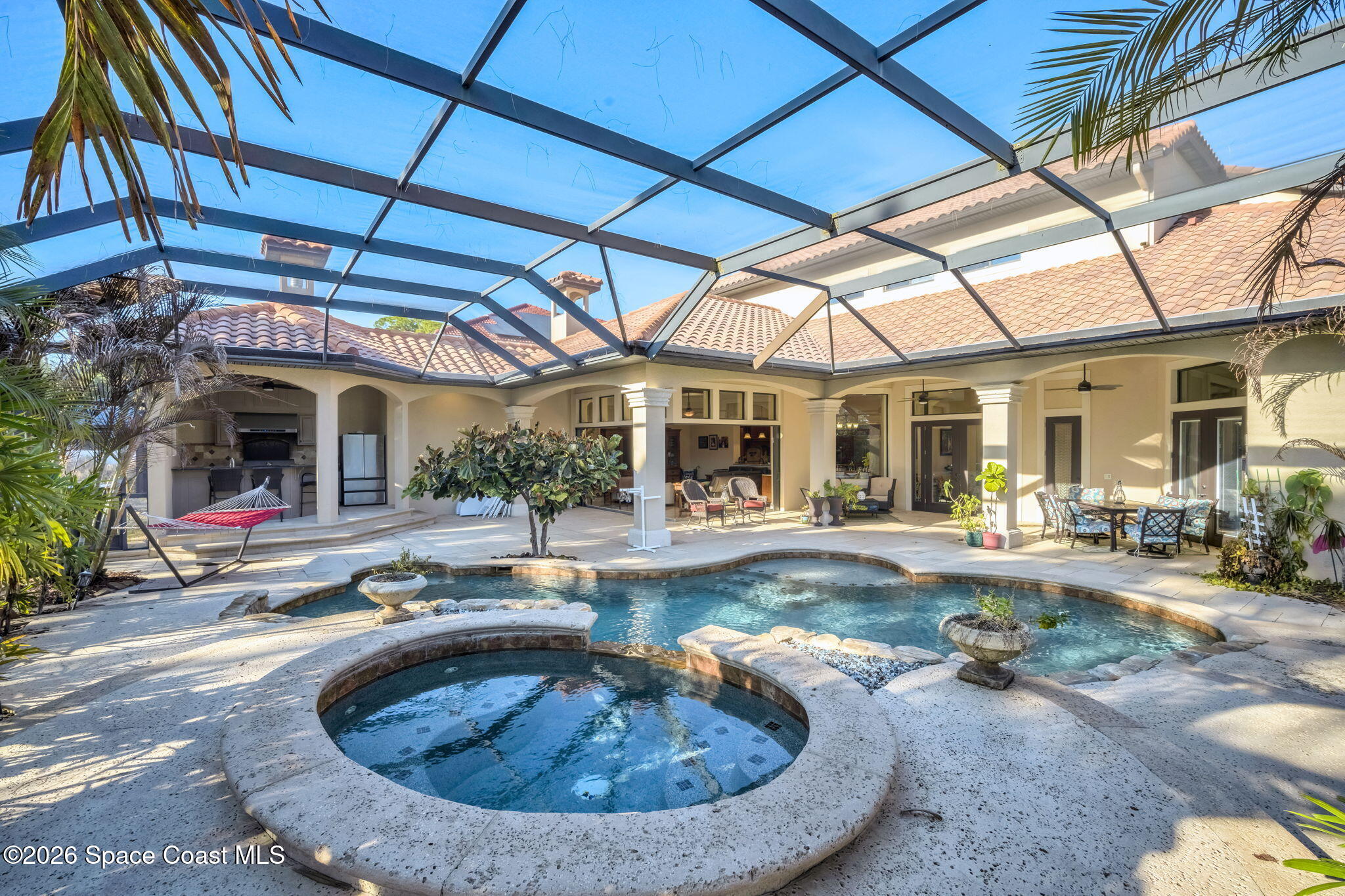 5454 Riveredge Drive Titusville, FL 32780 - Photo 52 of 70 a view of a house with swimming pool