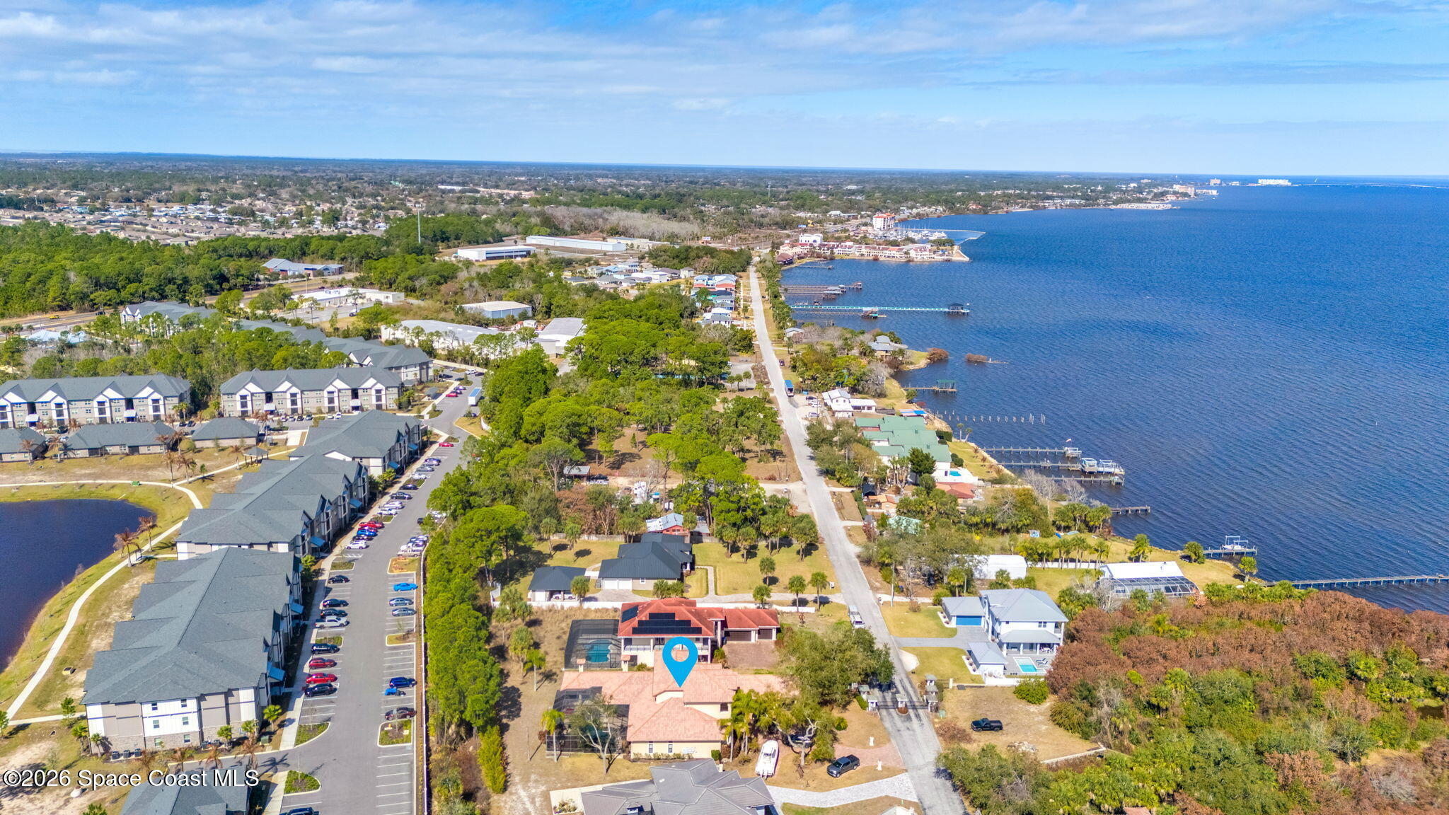 5454 Riveredge Drive Titusville, FL 32780 - Photo 56 of 70 a view of a city with an ocean view