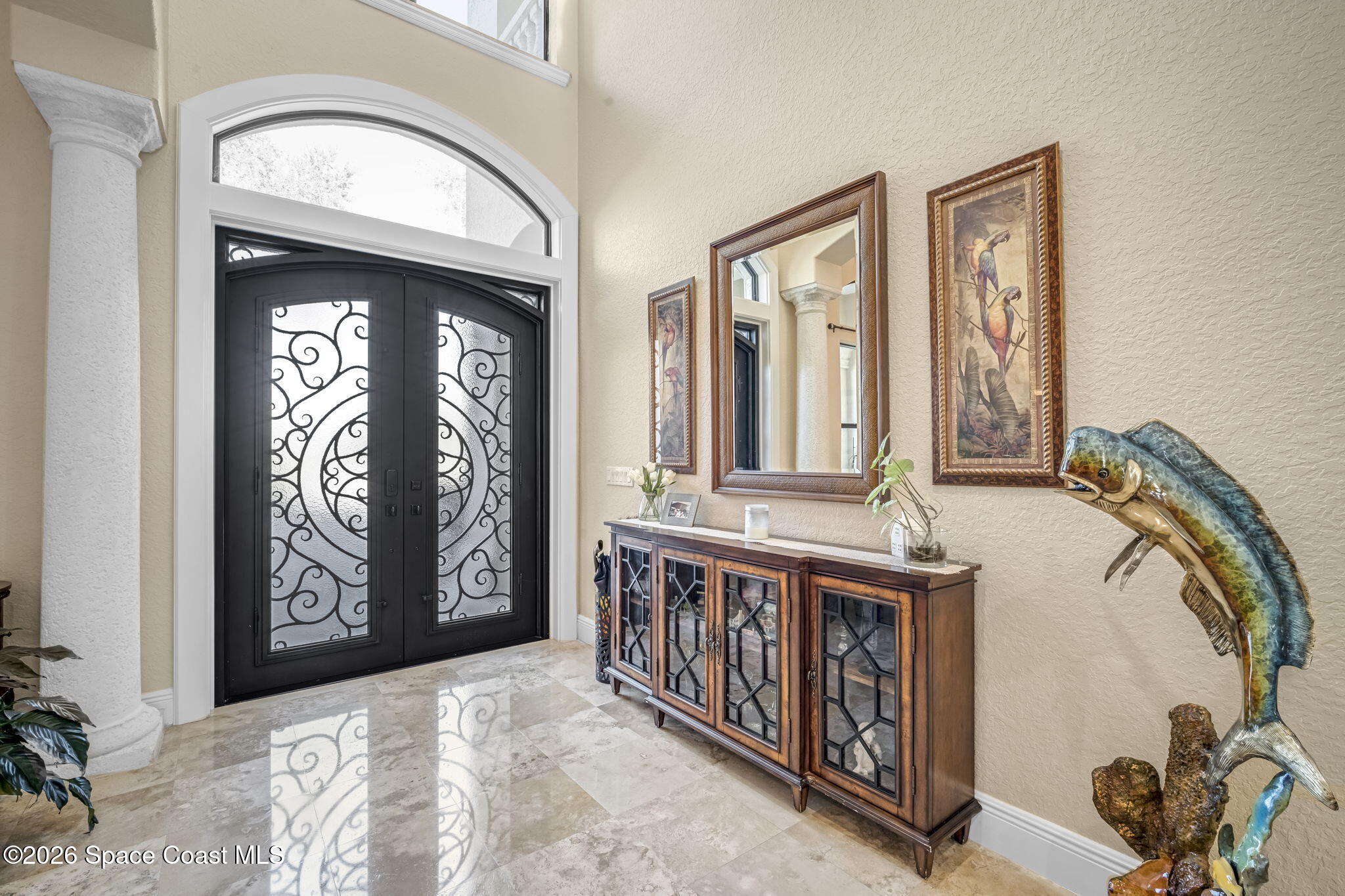 5454 Riveredge Drive Titusville, FL 32780 - Photo 6 of 70 a view of an entryway with a front door