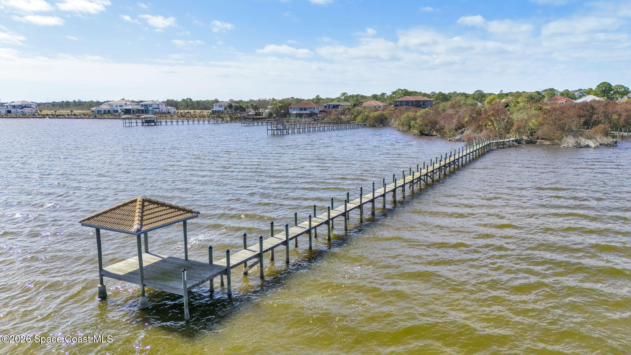 5454 Riveredge Drive Titusville, FL 32780 - Photo 61 of 70 a view of a terrace with sitting area