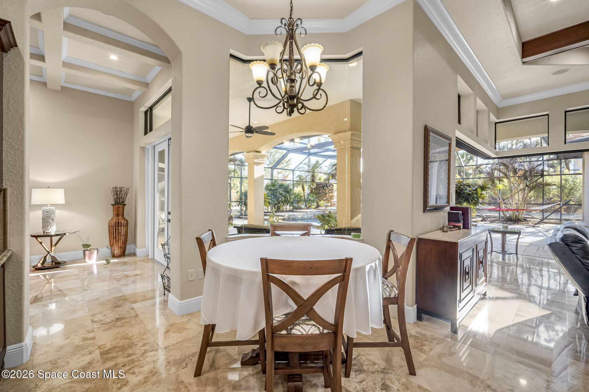 5454 Riveredge Drive Titusville, FL 32780 - Photo 9 of 70 a view of a dining room with furniture window and outside view