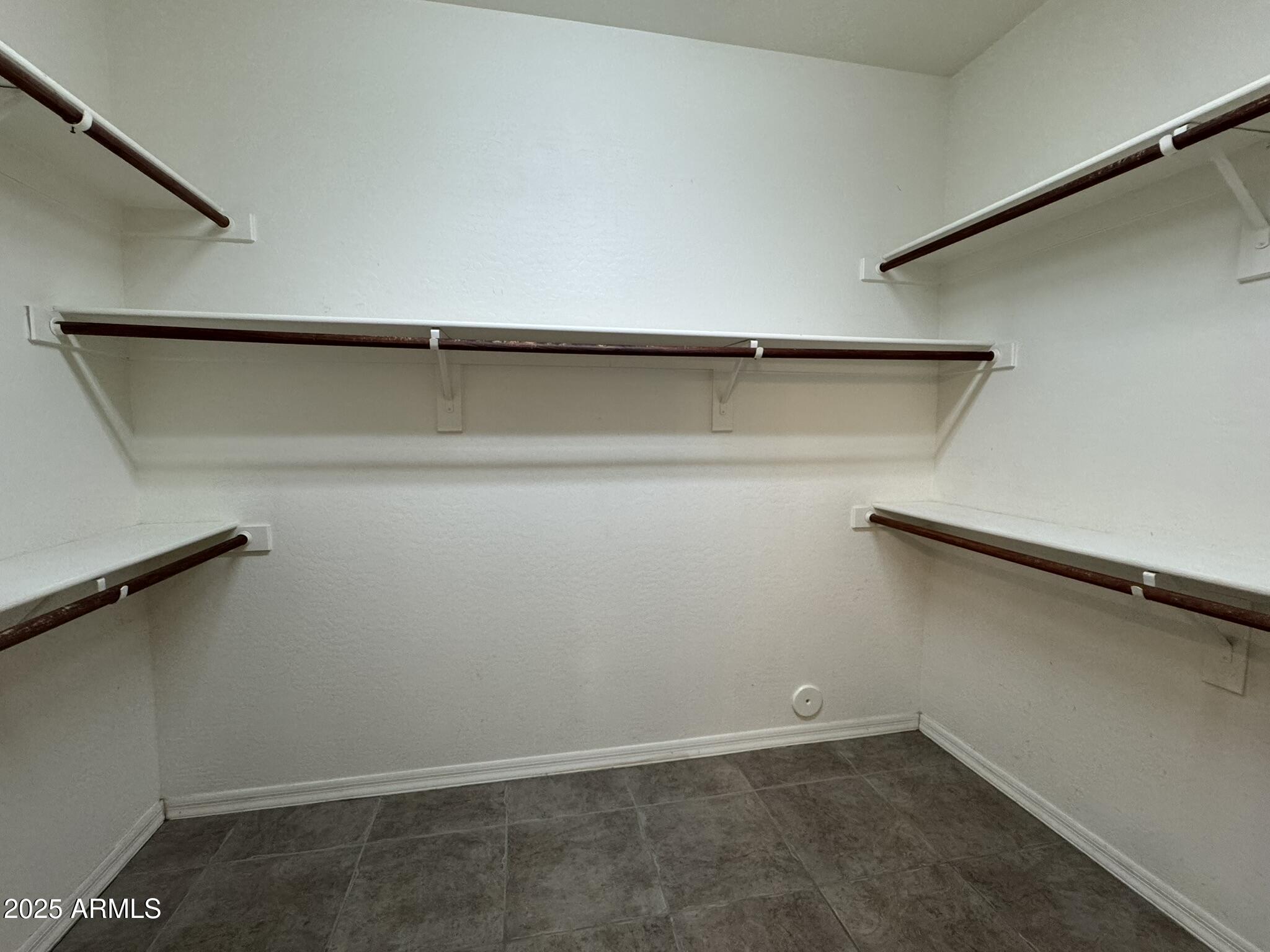 2671 South Dragoon Drive Chandler, AZ 85286 - Photo 16 of 41 a view of a room with shelf