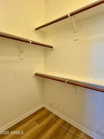 a view of a room with racks on the wall