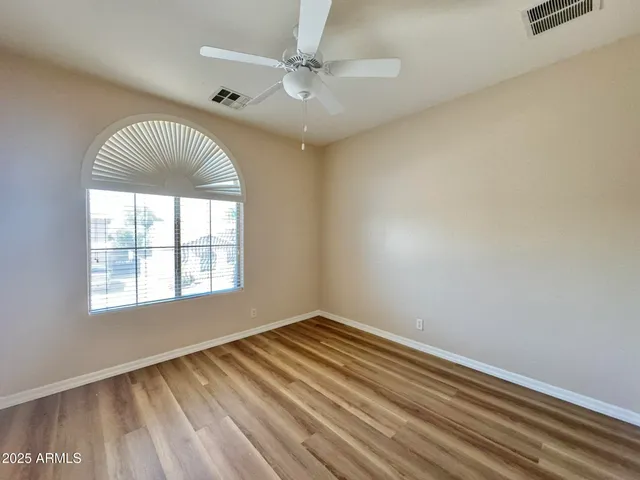 an empty room with windows