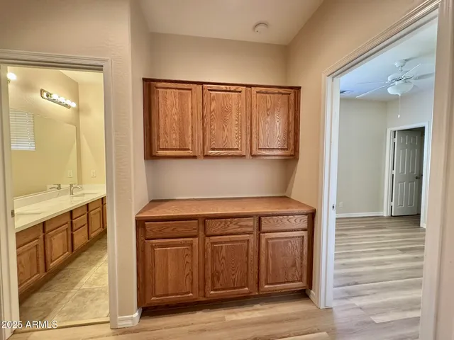 a view of hallway with washer and dryer