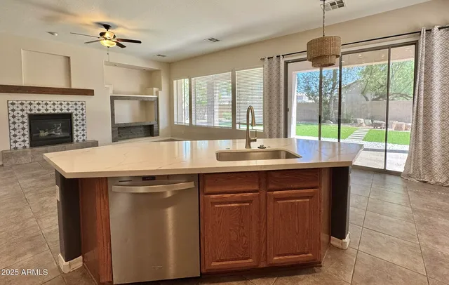 a room with sink and window