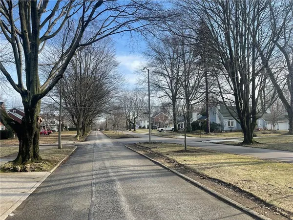 a building with trees in the background