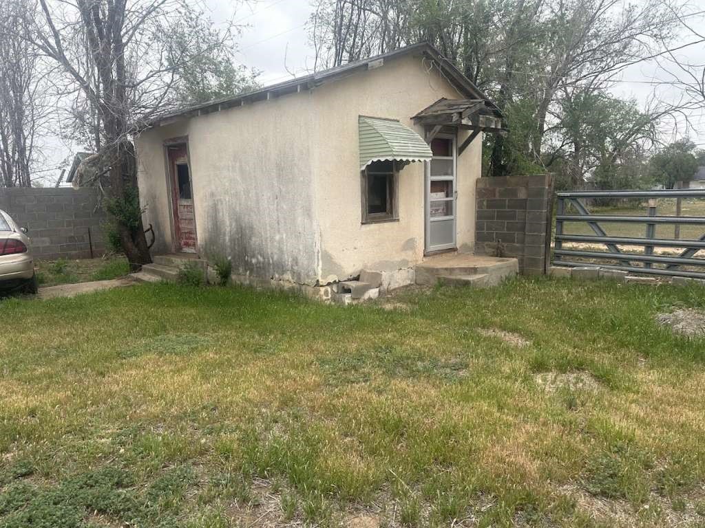 516 East Madison Street Lubbock, TX 79403 - Photo 6 of 18 a backyard of a house with lots of green space