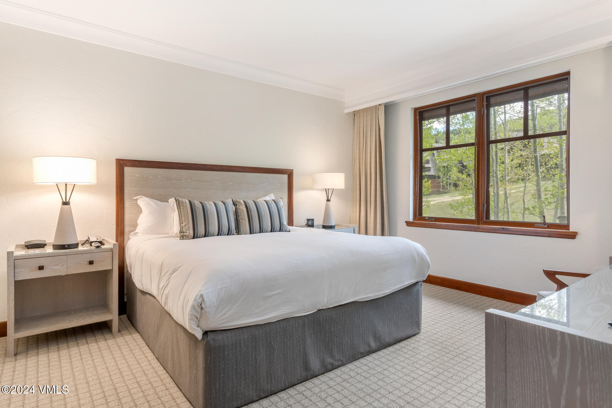 100 Bachelor Ridge Road, Unit 3606 Avon, CO 81620 - Photo 13 of 29 a bedroom with a large bed and a window