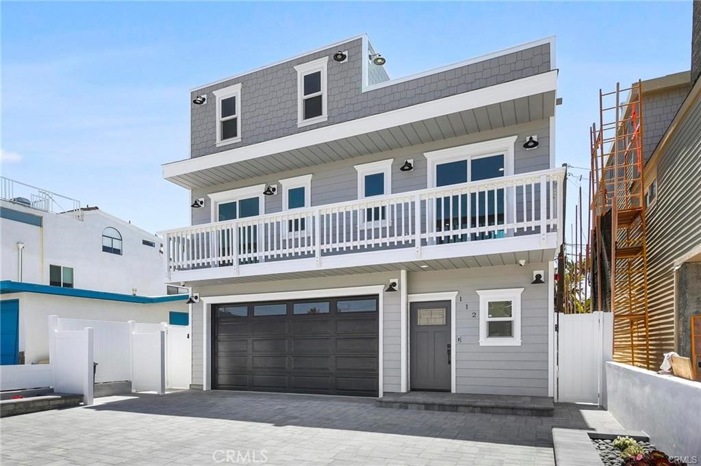 112 Van Nuys Avenue Oxnard, CA 93035 - Photo 1 of 58 a front view of a house with a garage