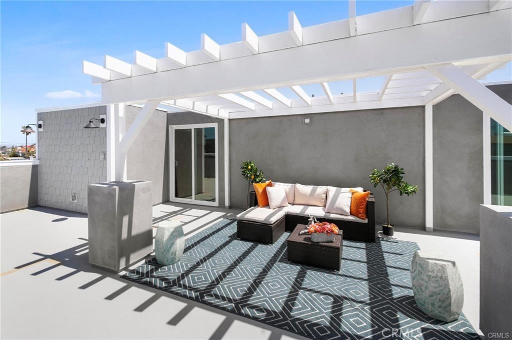 112 Van Nuys Avenue Oxnard, CA 93035 - Photo 22 of 58 a bed room with a bed and a couch