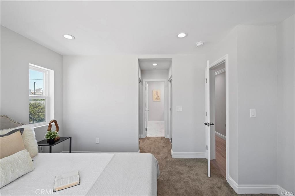 112 Van Nuys Avenue Oxnard, CA 93035 - Photo 33 of 58 a living room with a couch and a table