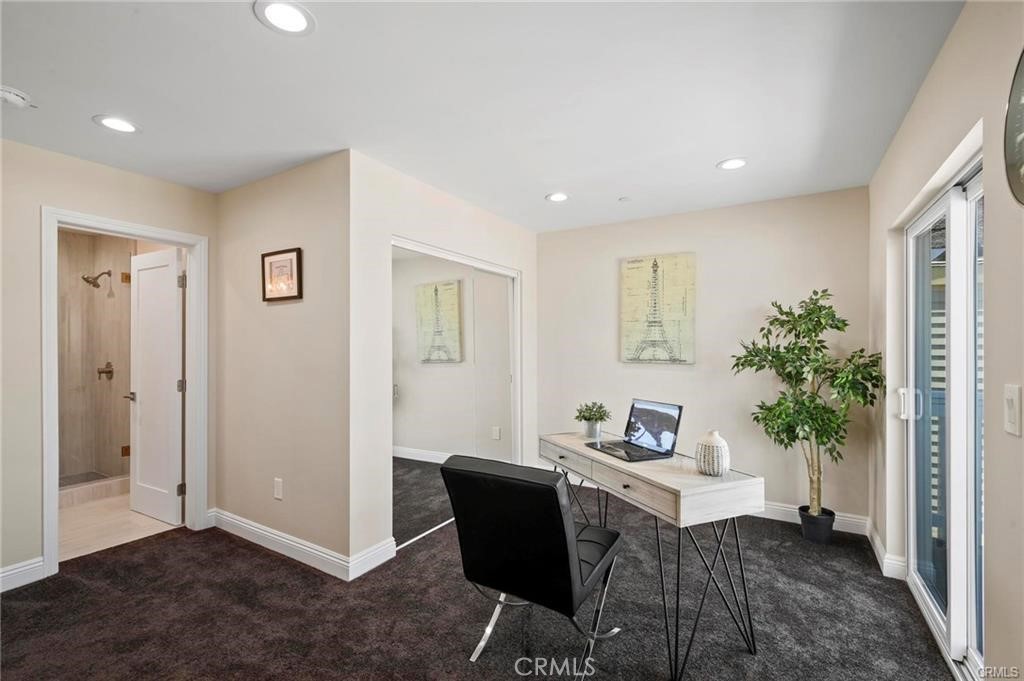 112 Van Nuys Avenue Oxnard, CA 93035 - Photo 40 of 58 a living room with furniture and a potted plant