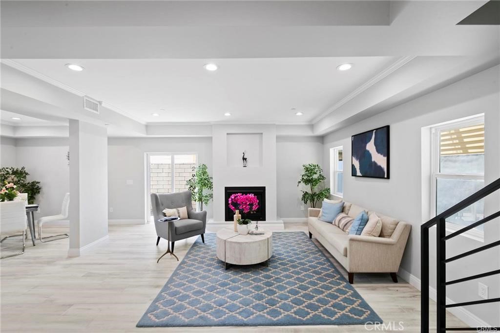 112 Van Nuys Avenue Oxnard, CA 93035 - Photo 49 of 58 a living room with furniture and a rug