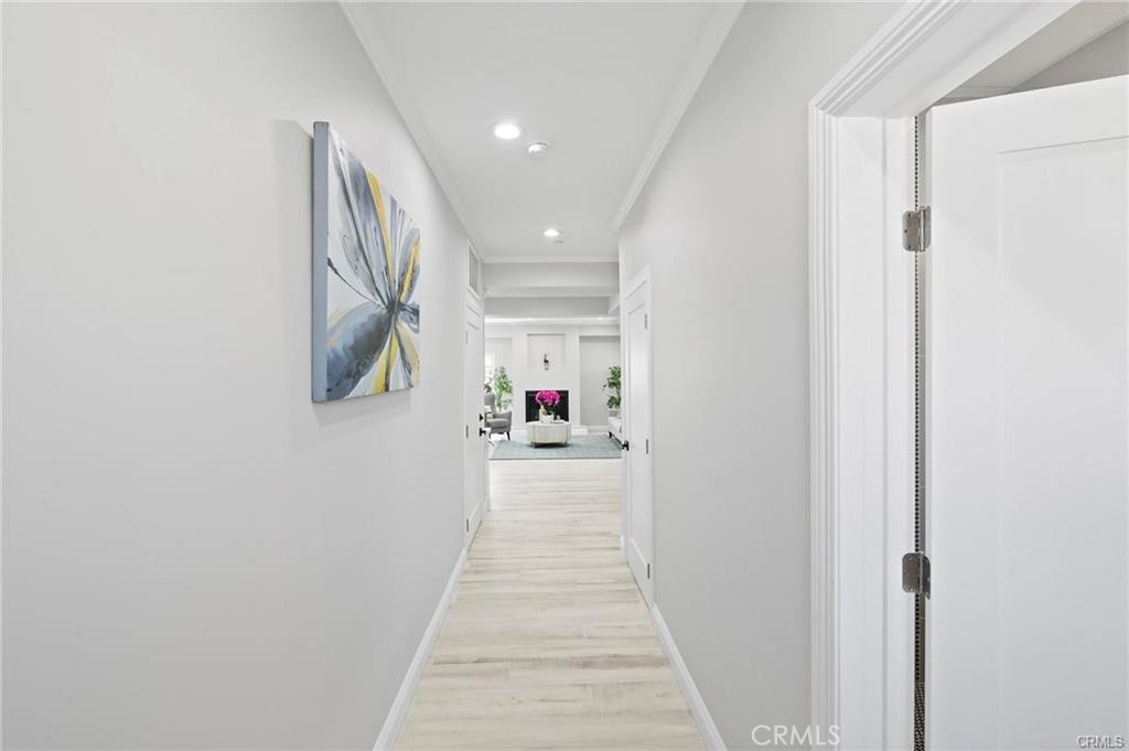 112 Van Nuys Avenue Oxnard, CA 93035 - Photo 53 of 58 a view of a hallway with wooden floor and staircase