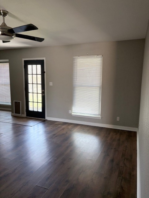 1917 Castle Gate Circle San Marcos, TX 78666 - Photo 18 of 21 Spare room with dark wood finished floors and ceiling fan