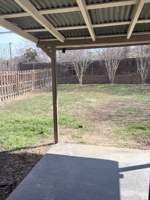 1917 Castle Gate Circle San Marcos, TX 78666 - Photo 20 of 21 Fenced backyard featuring a patio area