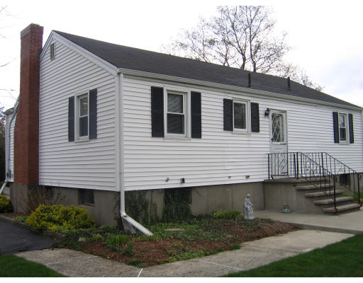 1 Samoset Road Woburn, MA 01801 - Photo 3 of 11 a view of a house with a yard