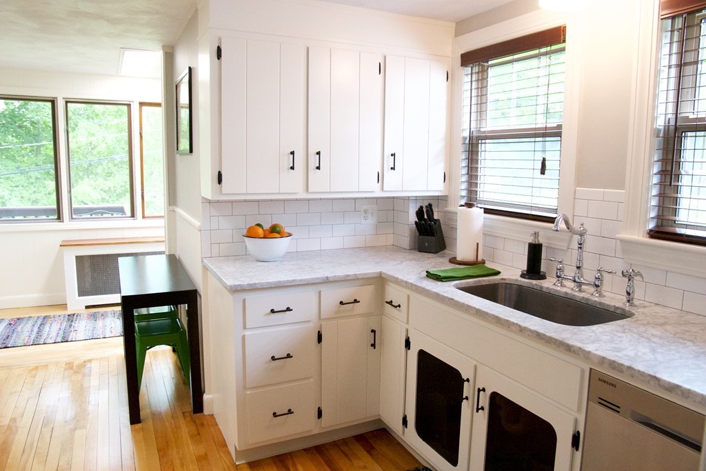 41 Havelock Road Worcester, MA 01602 - Photo 5 of 30 a kitchen with white cabinets and sink