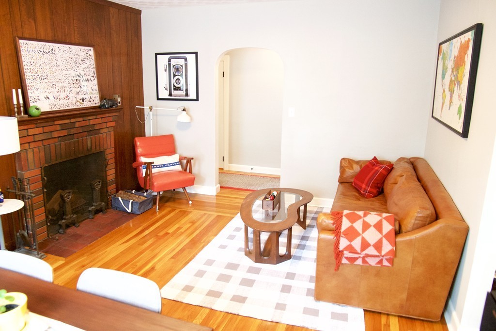 41 Havelock Road Worcester, MA 01602 - Photo 10 of 30 a living room with furniture a flat screen tv and a fireplace