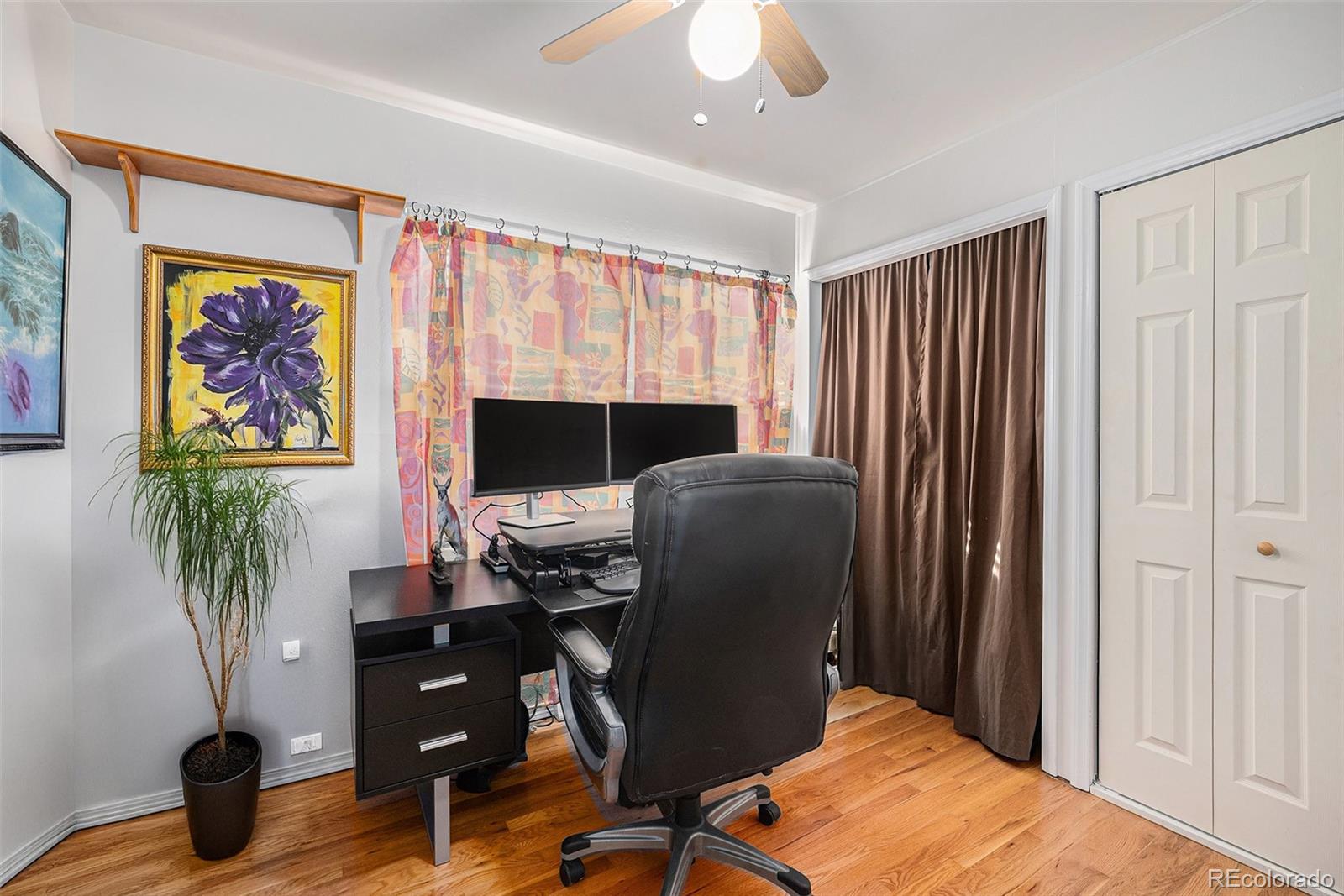 8601 Cedar Lane Westminster, CO 80031 - Photo 15 of 20 a view of a workspace with furniture and a window
