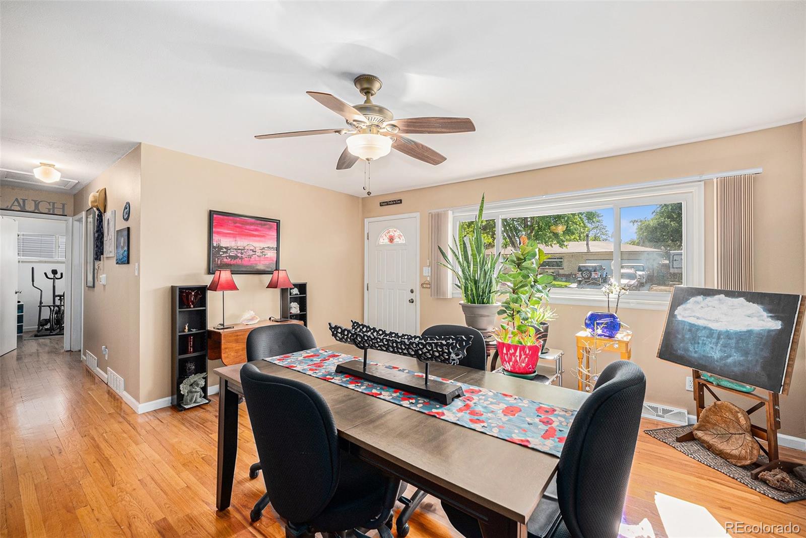 8601 Cedar Lane Westminster, CO 80031 - Photo 4 of 20 a work room with furniture and a large window