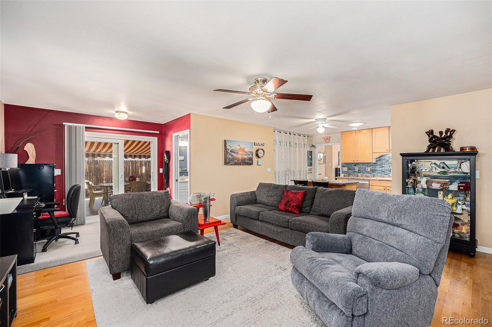 8601 Cedar Lane Westminster, CO 80031 - Photo 5 of 20 a living room with furniture and a large window