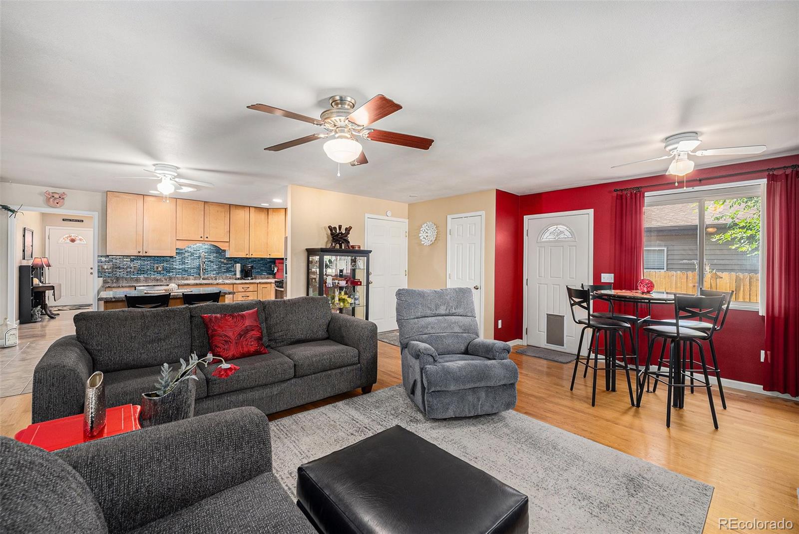 8601 Cedar Lane Westminster, CO 80031 - Photo 6 of 20 a living room with furniture kitchen view and a large window