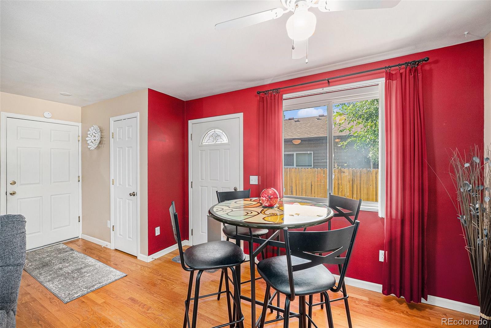 8601 Cedar Lane Westminster, CO 80031 - Photo 7 of 20 a dining room with furniture and window