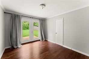 2756 Gresham Rd S East Atlanta, GA 30316 - Photo 27 of 32 an empty room with wooden floor and windows
