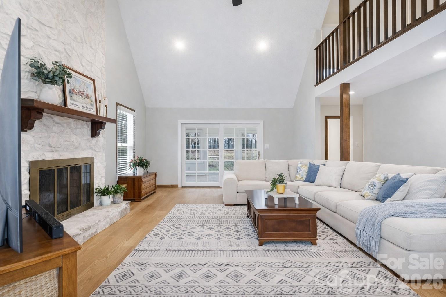 107 Friendfield Drive Fort Mill, SC 29715 - Photo 15 of 36 a living room with furniture and a fireplace