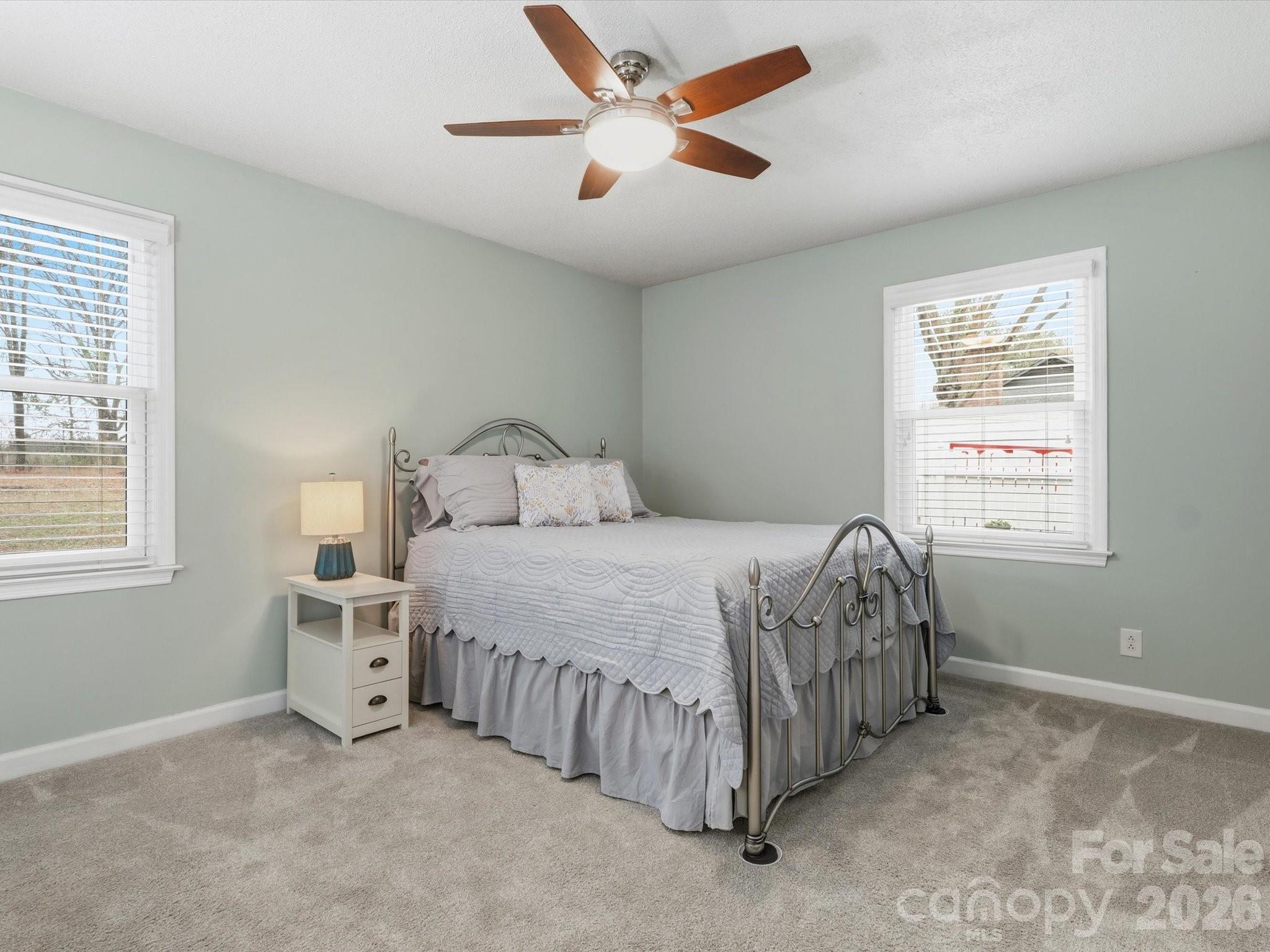 107 Friendfield Drive Fort Mill, SC 29715 - Photo 16 of 40 a bedroom with a bed and a window