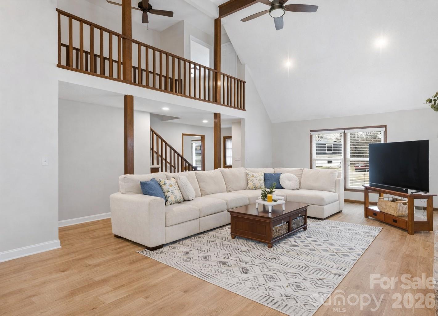 107 Friendfield Drive Fort Mill, SC 29715 - Photo 17 of 36 a living room with furniture and a flat screen tv