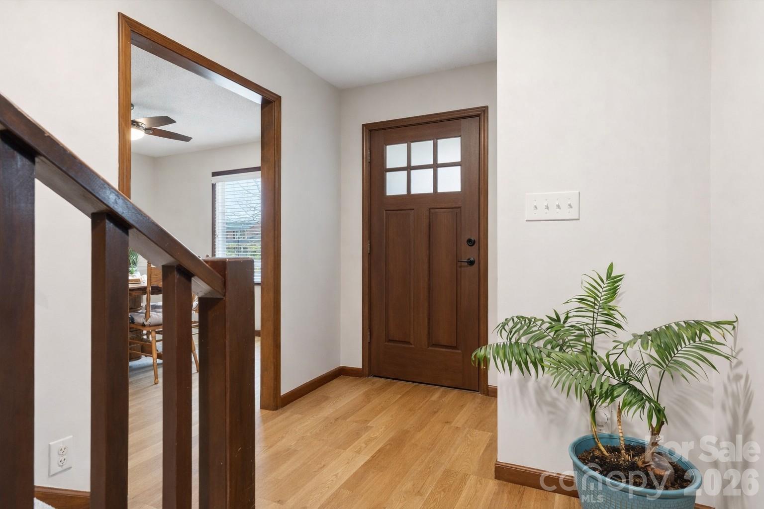 107 Friendfield Drive Fort Mill, SC 29715 - Photo 20 of 36 a view of entryway with wooden floor and a potted plant