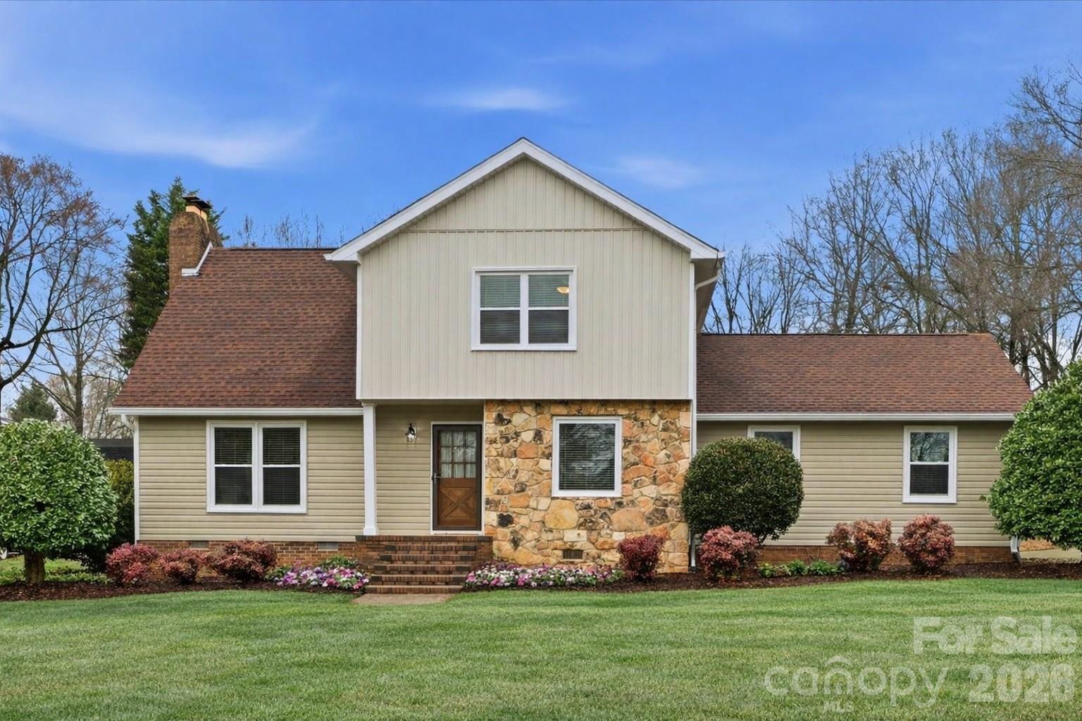 107 Friendfield Drive Fort Mill, SC 29715 - Photo 2 of 36 a front view of a house with a yard