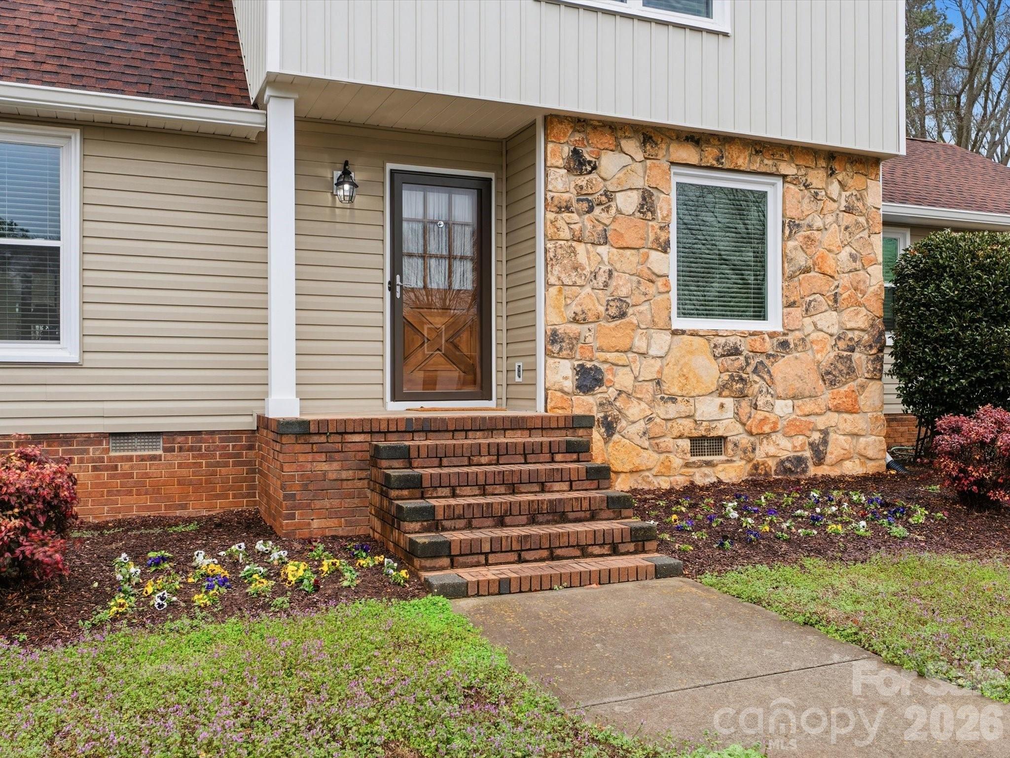 107 Friendfield Drive Fort Mill, SC 29715 - Photo 2 of 40 a front view of a house with a yard